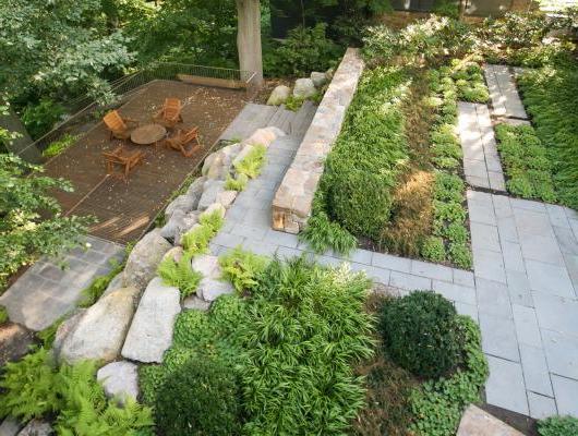 Woodland landscape setting by LeBlanc Jones Landscape Architects